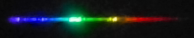 Photograph of emission spectrum of Copper.